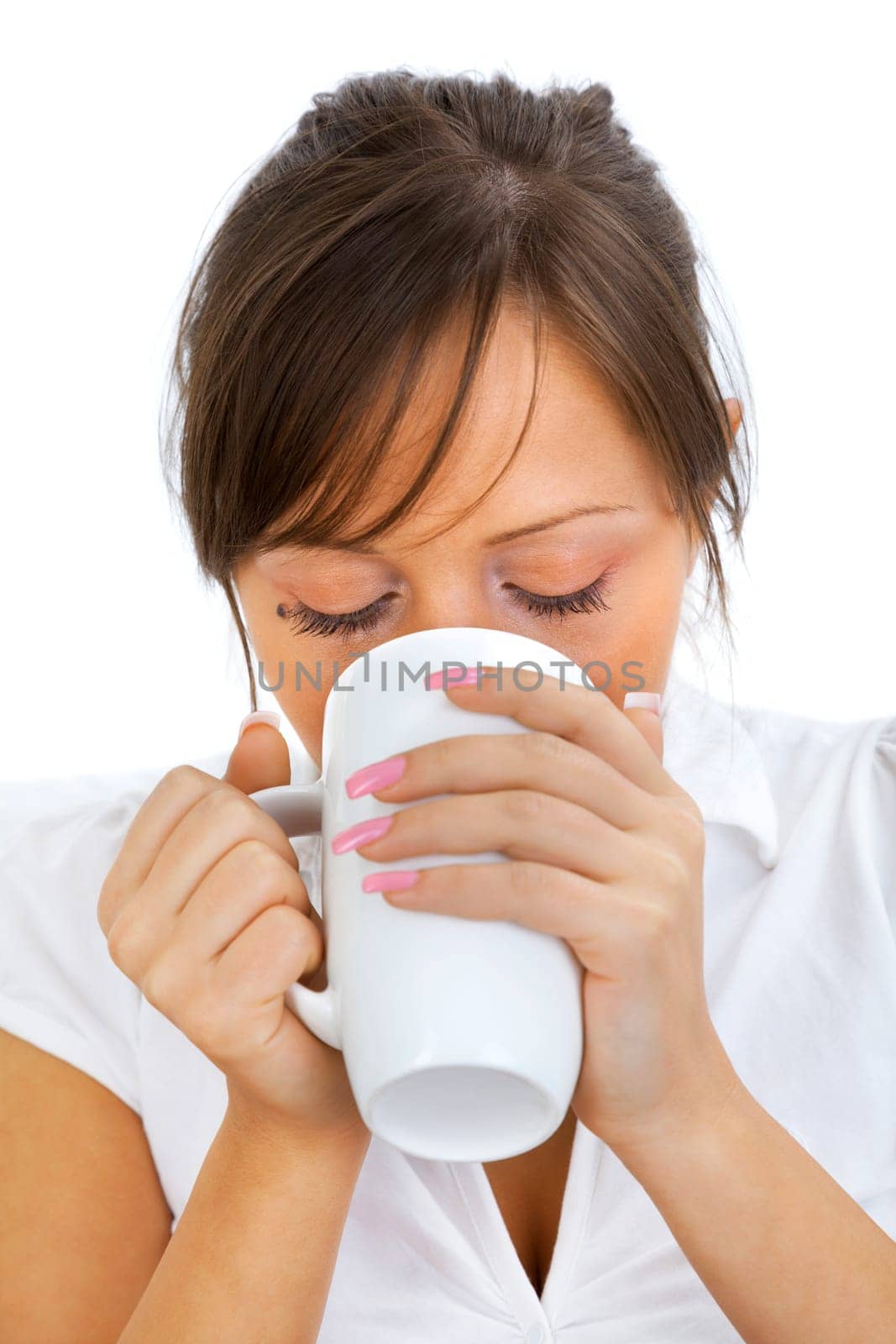 Young woman drinking big coffee with milk sitting on the sofa isolated on white background