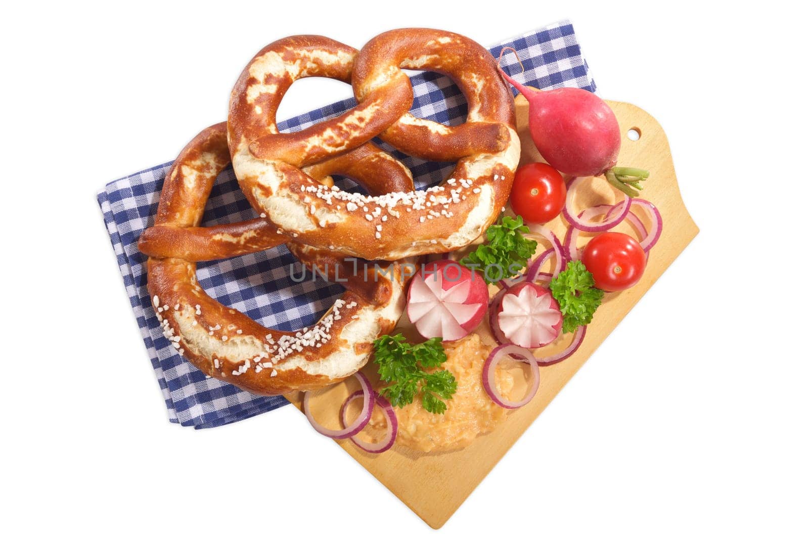 Bavarian vegetarian breakfast with two pretzels and obazda on a white background