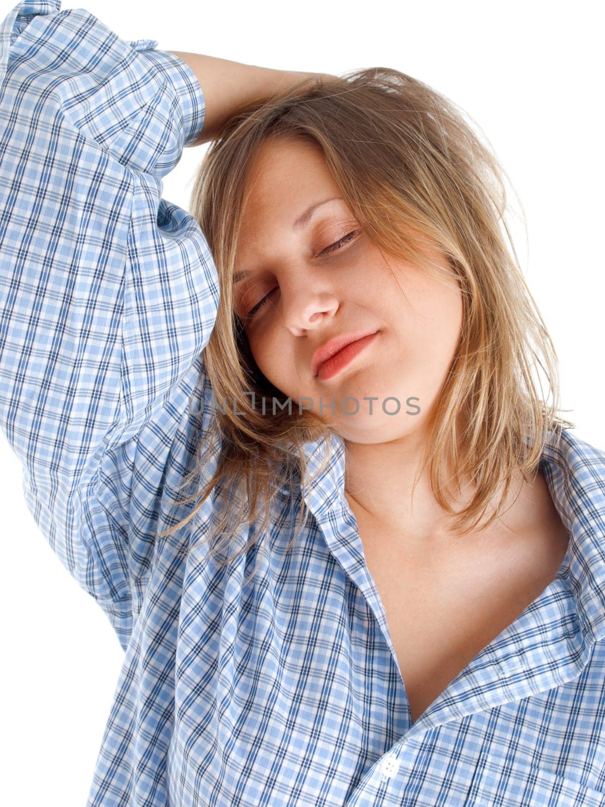 Young woman yawning isolated on white