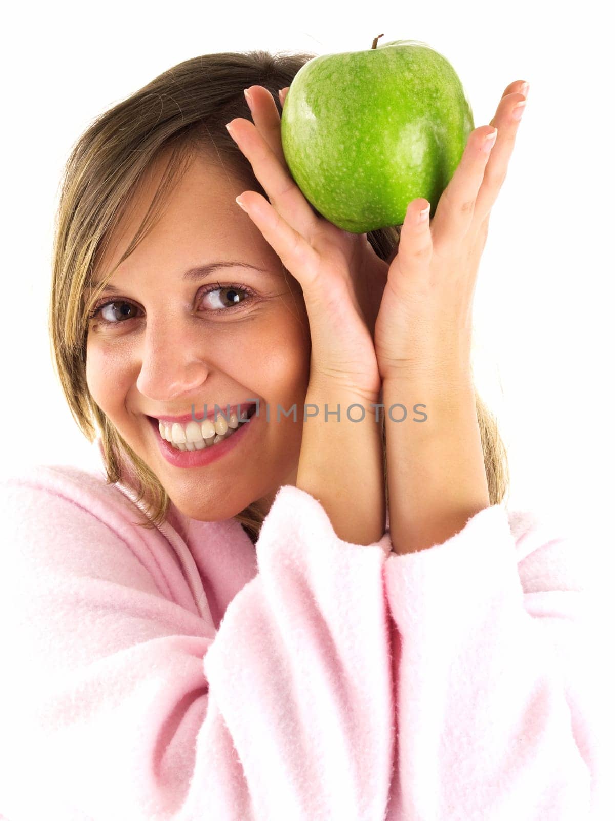 Woman in housecoat with apple