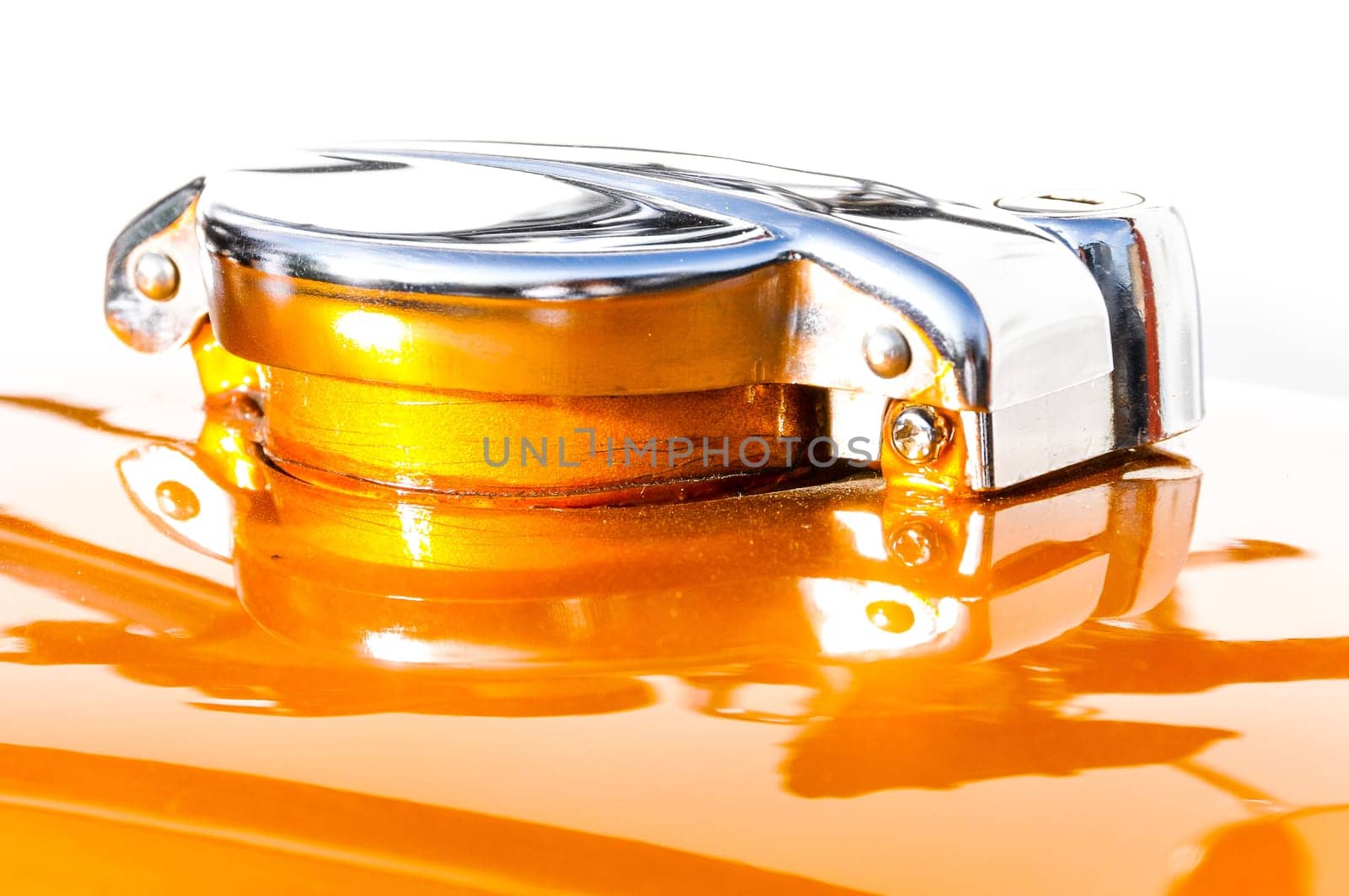 closeup of a fuel tank cap of a classic old motorbike