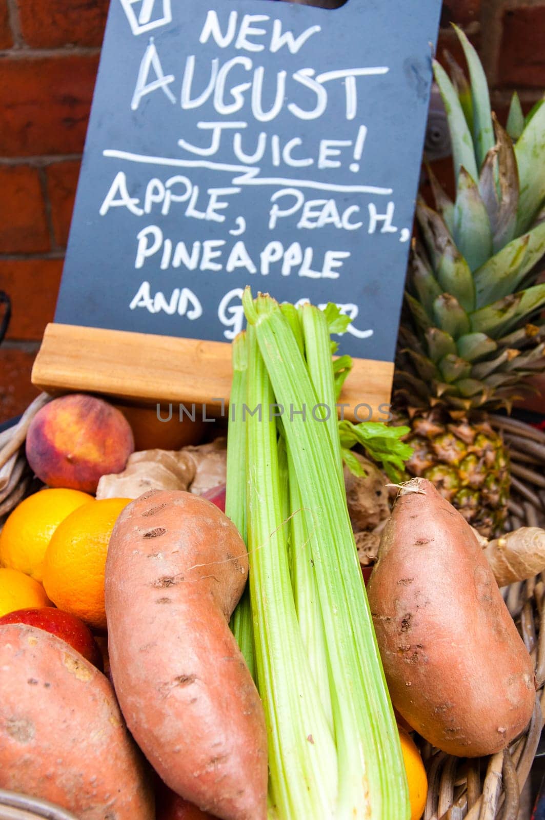 Fresh vegetables and fruits in a basket for juice