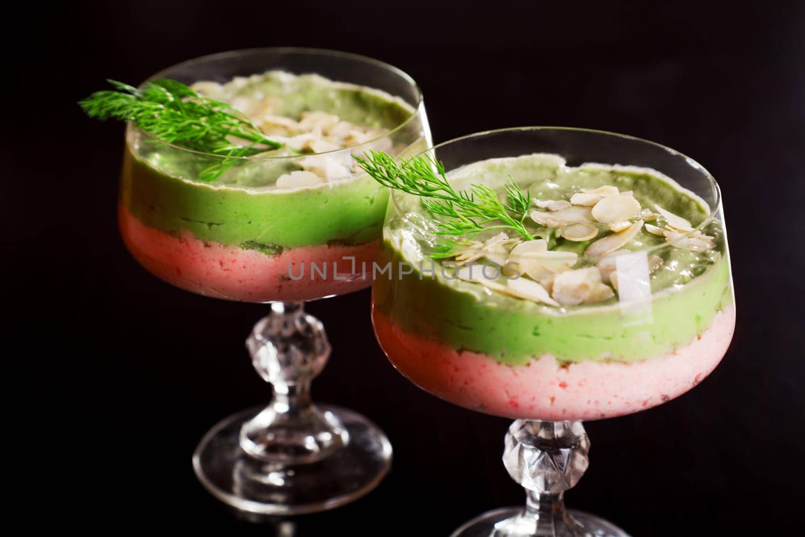 Crab mousse is made of crab meat or surimi, mascarpone, red bell pepper and garlic..Avocado mousse is made of avocados, mascarpone, green bell pepper, garlic, salt, lemon juice