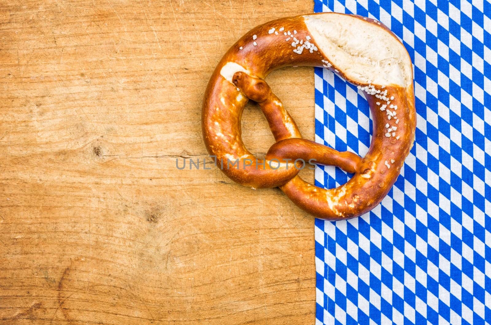 Pretzel with a Bavarian tablecloth