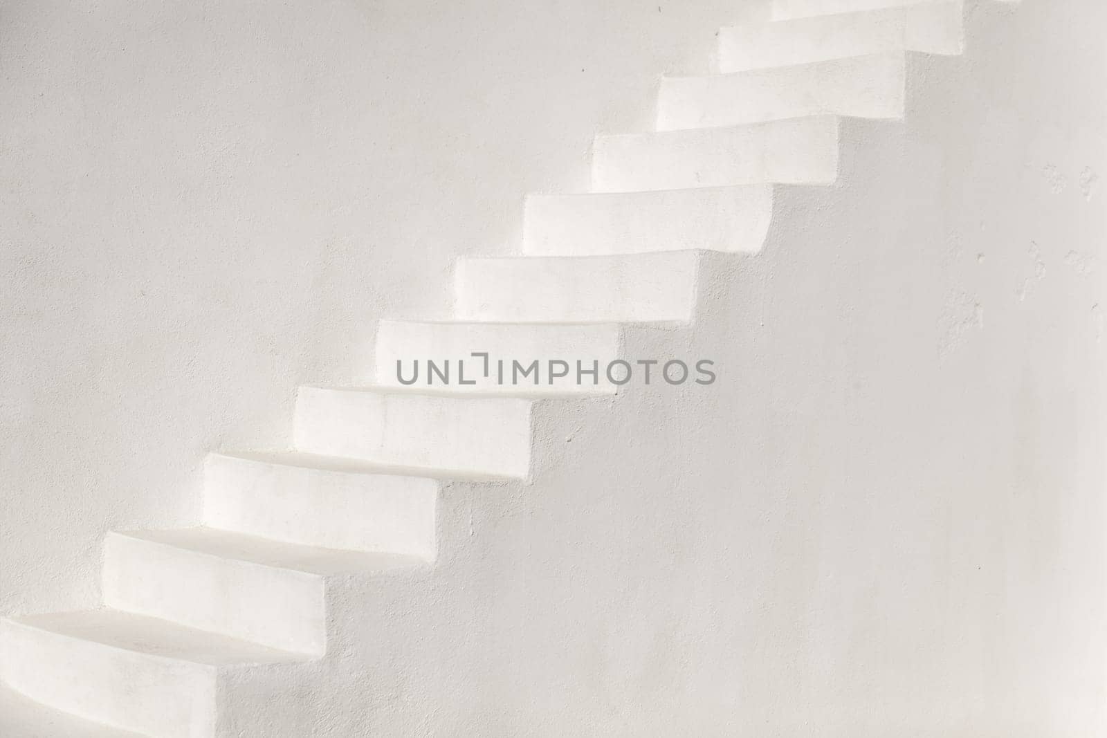 White stairs on a church wall in Oia, Santorini