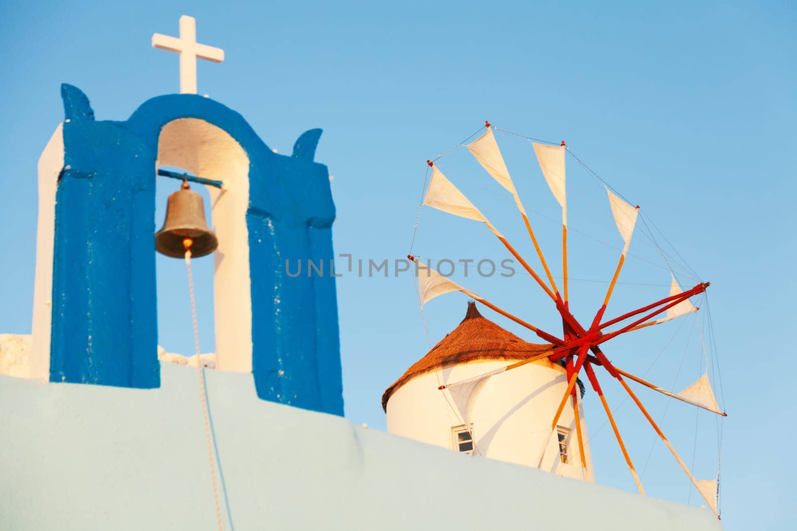 Windmill in Oia, Santorini during a sunny summer day