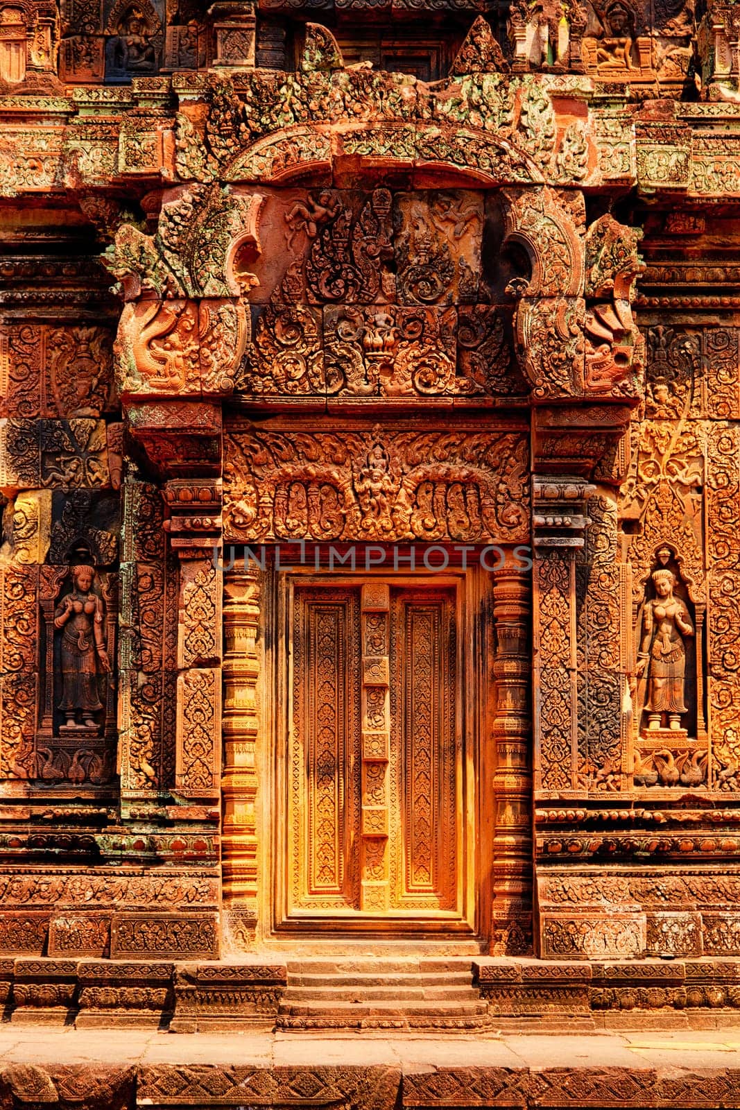 Banteay Srei - 10th century Cambodian temple dedicated to the Hindu god Shiva, located in the area of Angkor in Cambodia. It is built largely of red sandstone. Banteay Srei is known for the intricacy of its carvings and saturated colors.