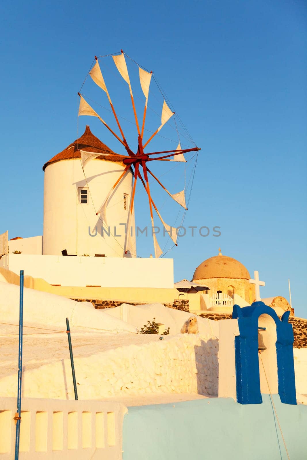 Windmill in Oia, Santorini during a sunny summer day