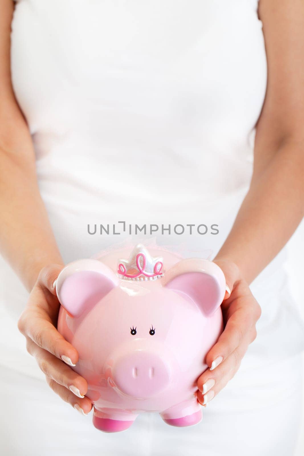 Younw woman holding pink pig money-box - Piggy Bank