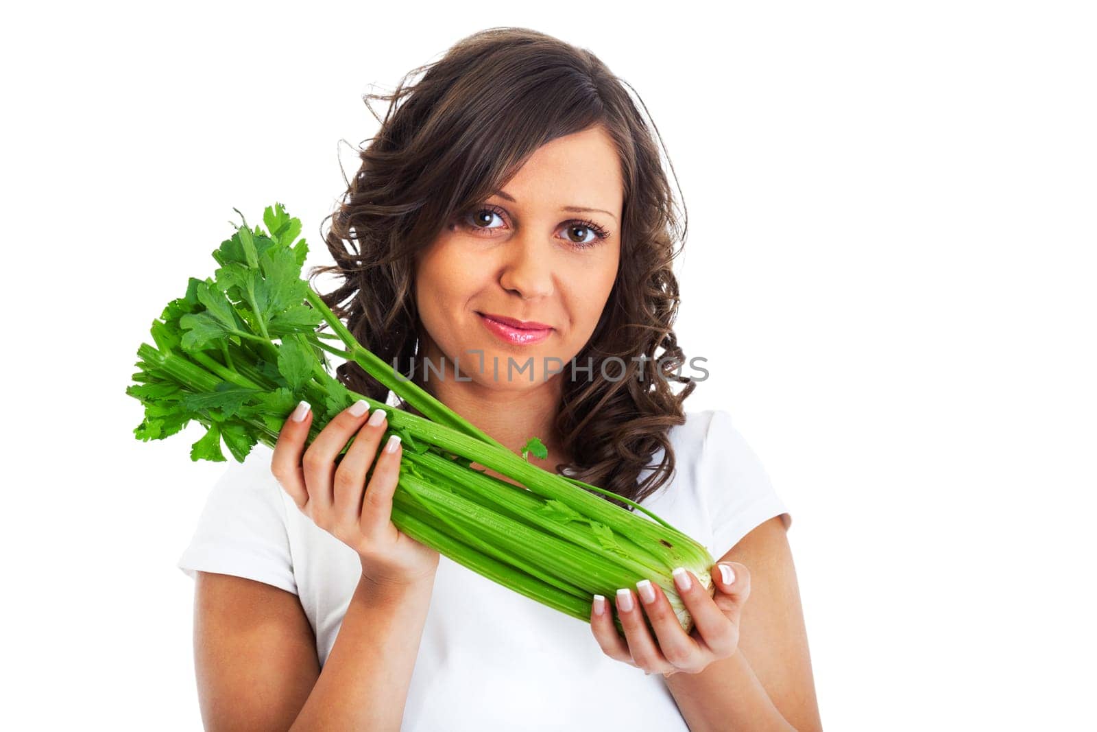 Young woman holding celery isolated on white