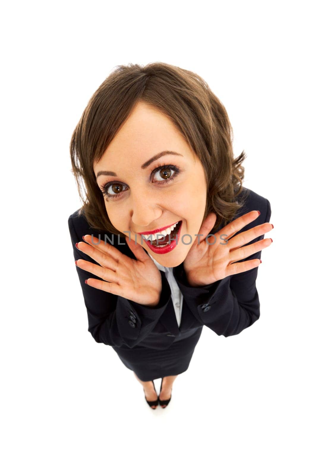 Businesswoman punching the air with angerisolated on white background shot with wide angle lenses