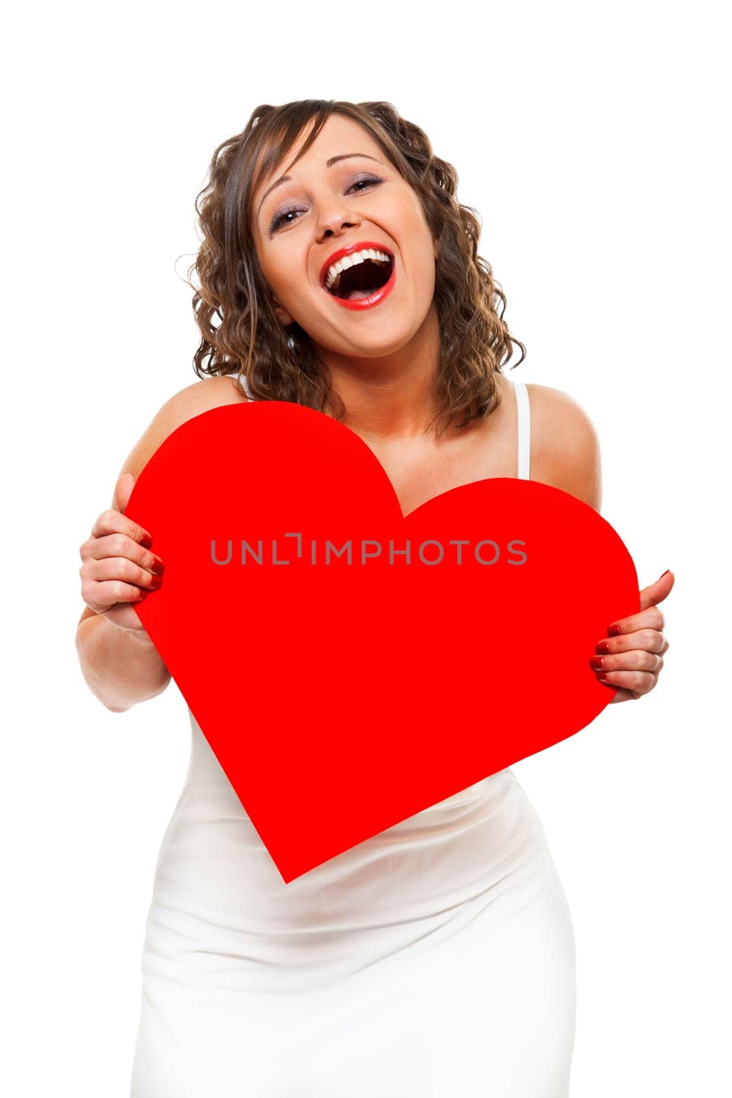 Young attractive woman holding red paper heart like a valentine card