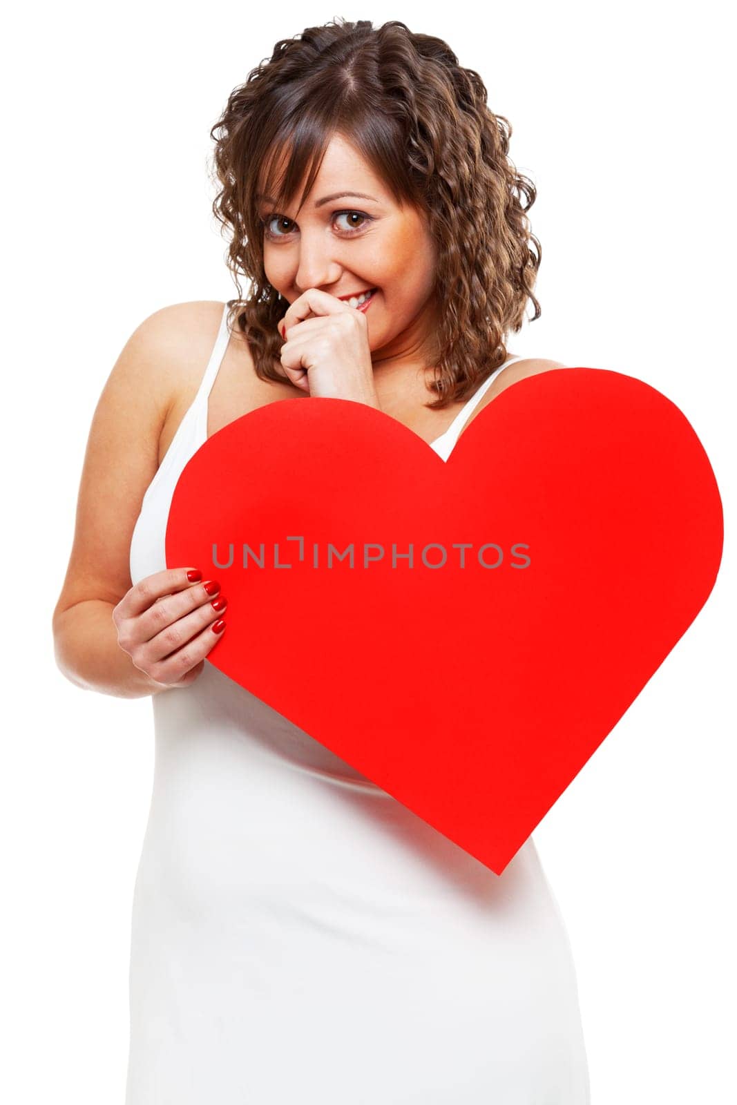 Young attractive woman holding red paper heart like a valentine card