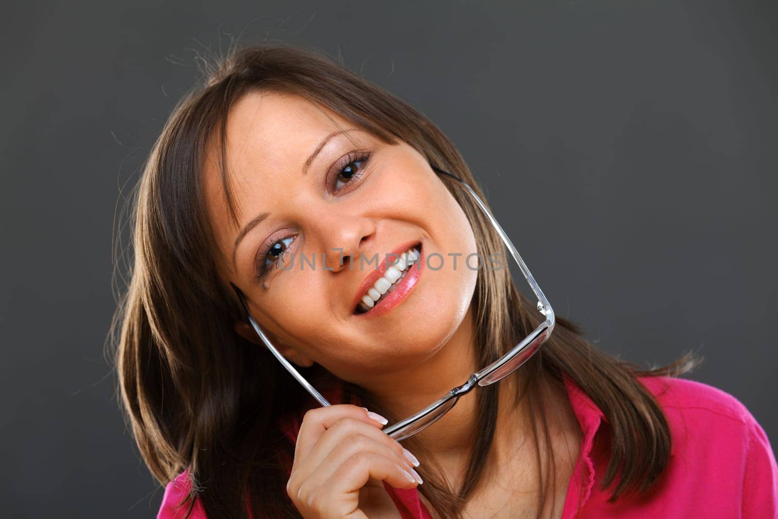 Woman with eyeglasses isolated on black