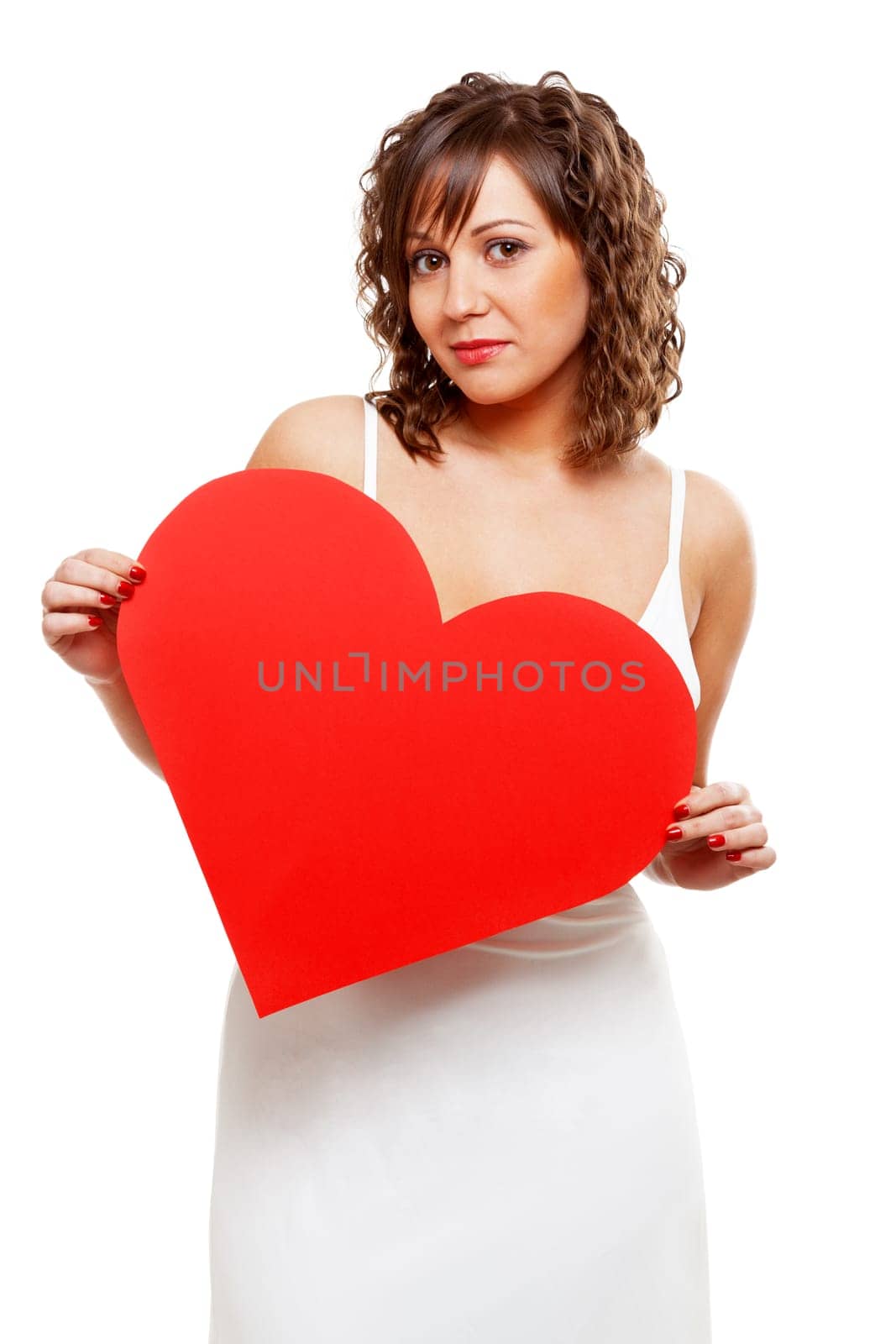 Young attractive woman holding red paper heart like a valentine card