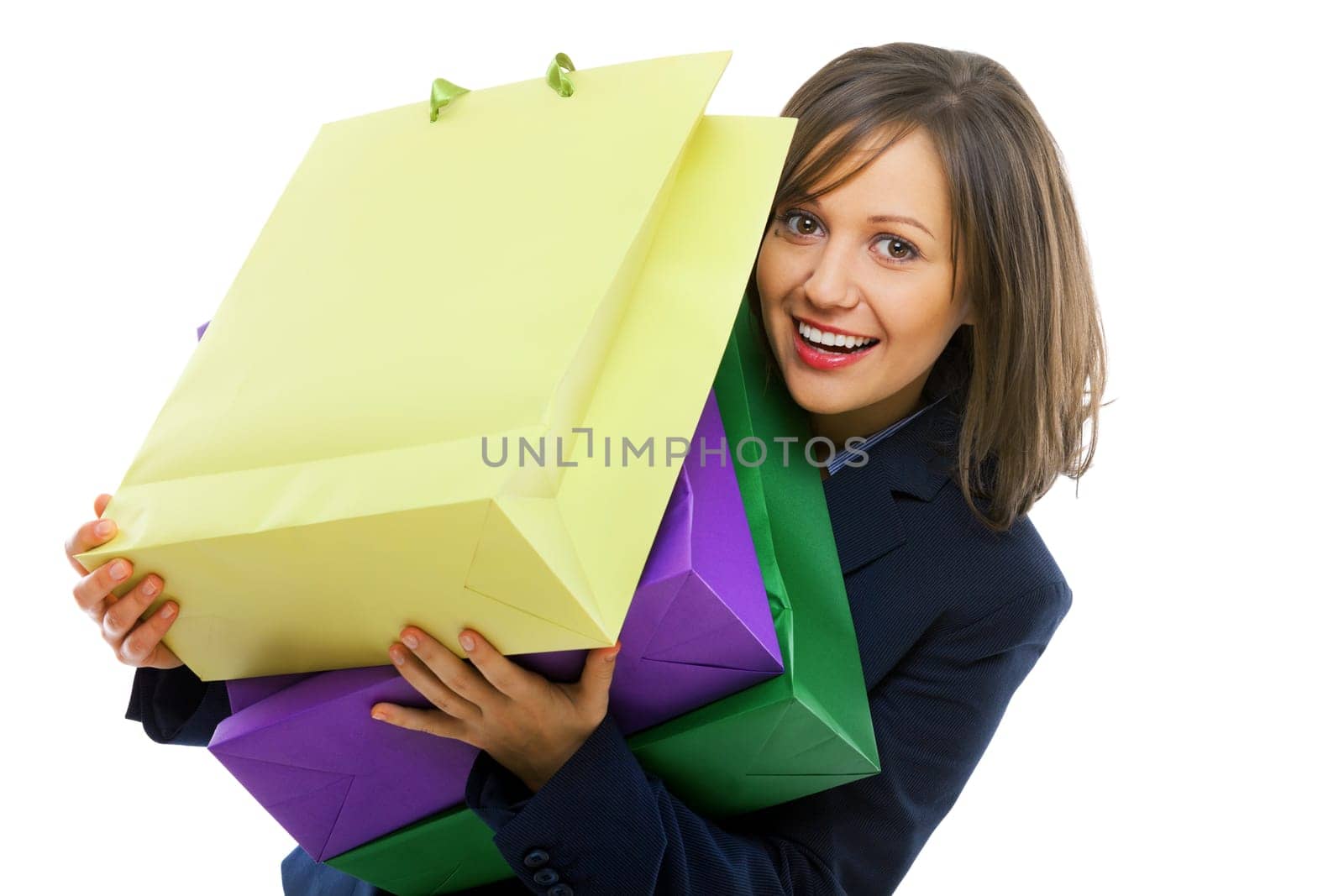 Businesswoman holding colorful presents isolated on white background