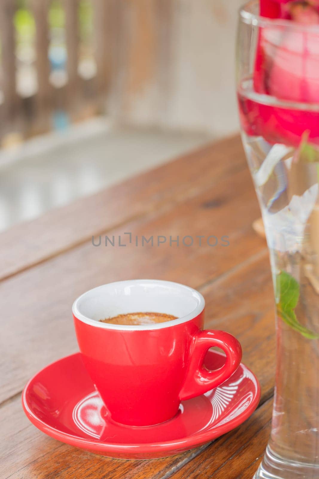 Hot espresso serving on wooden table, stock photo