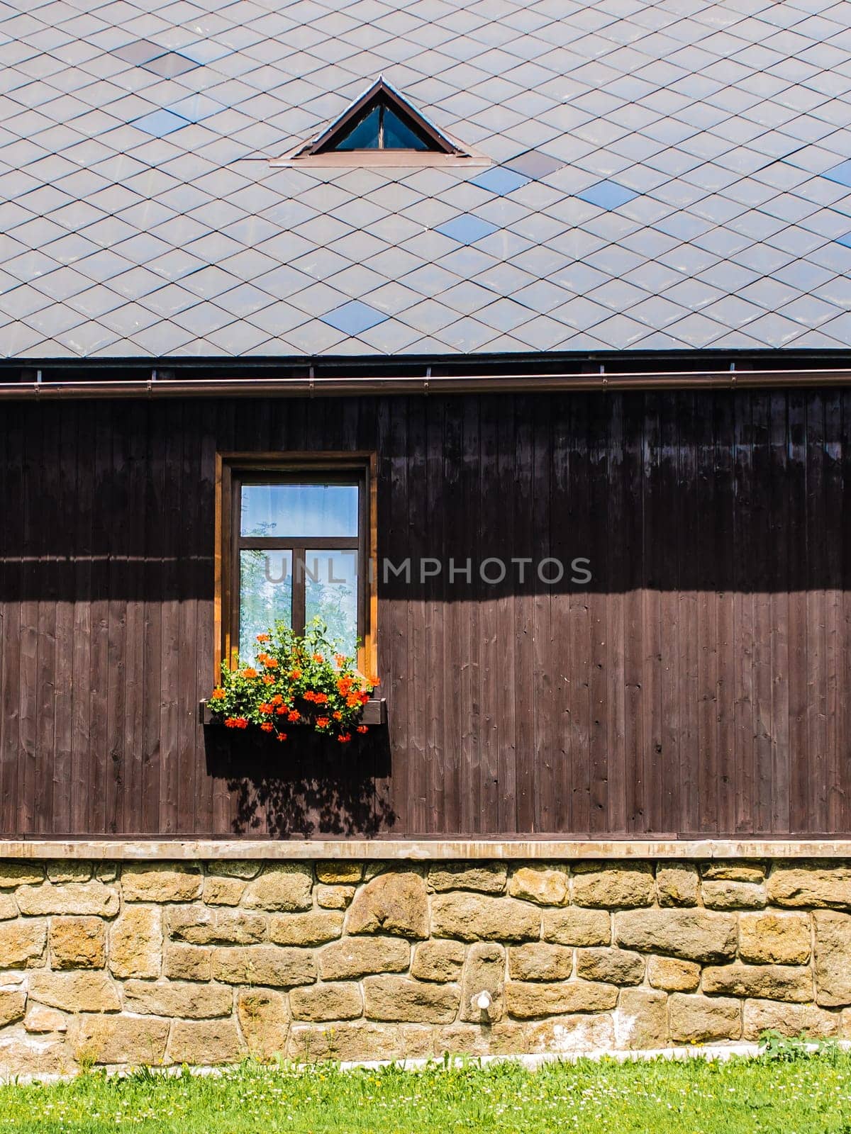 Rustic window in a mountain cottage in Bohemian Forrest, Czech republic, Europe