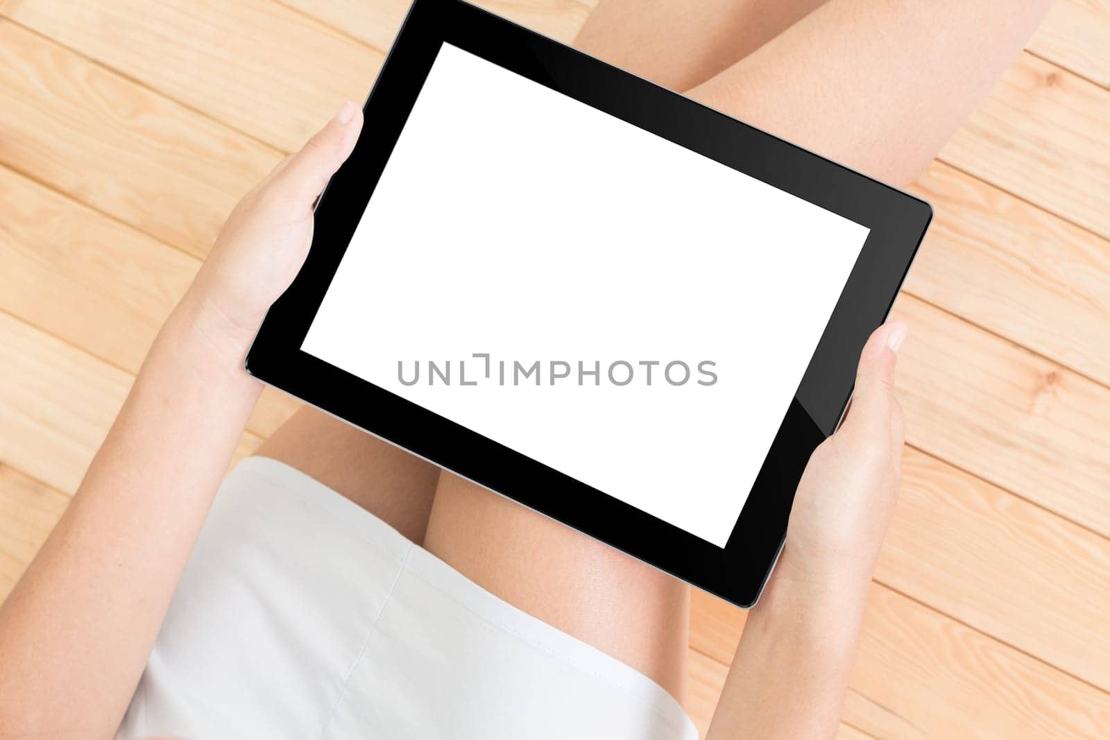 women hold tablet device on top view