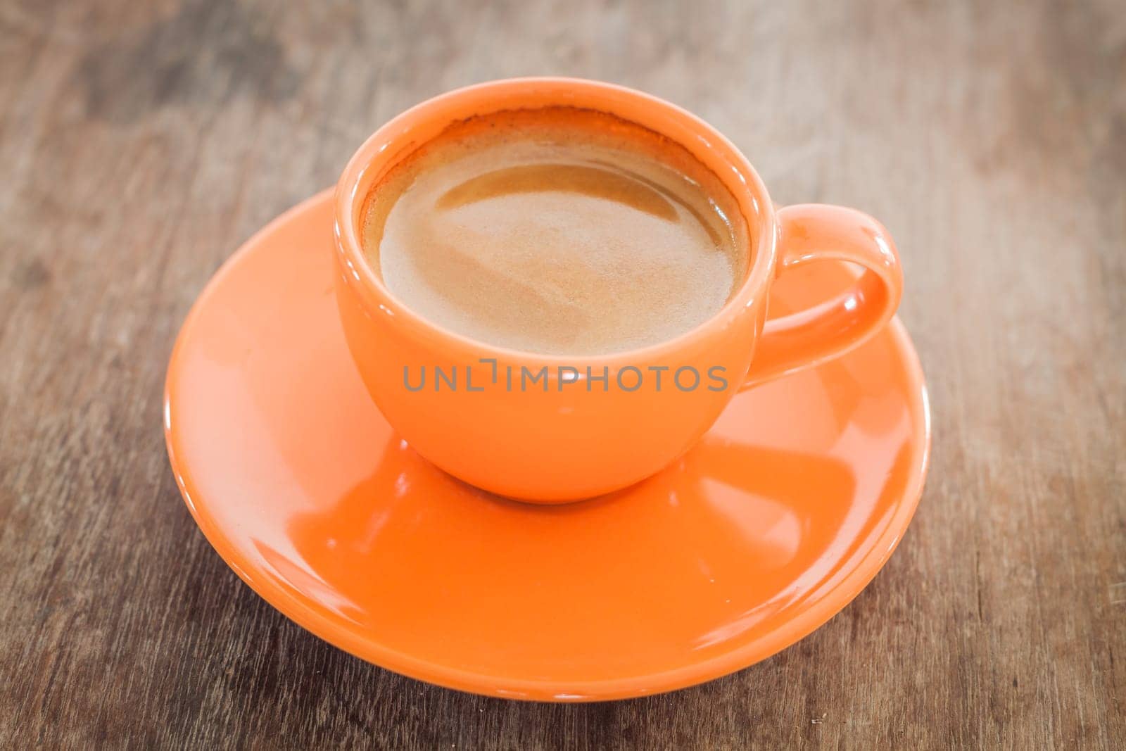 Hot coffee on wooden table, stock photo