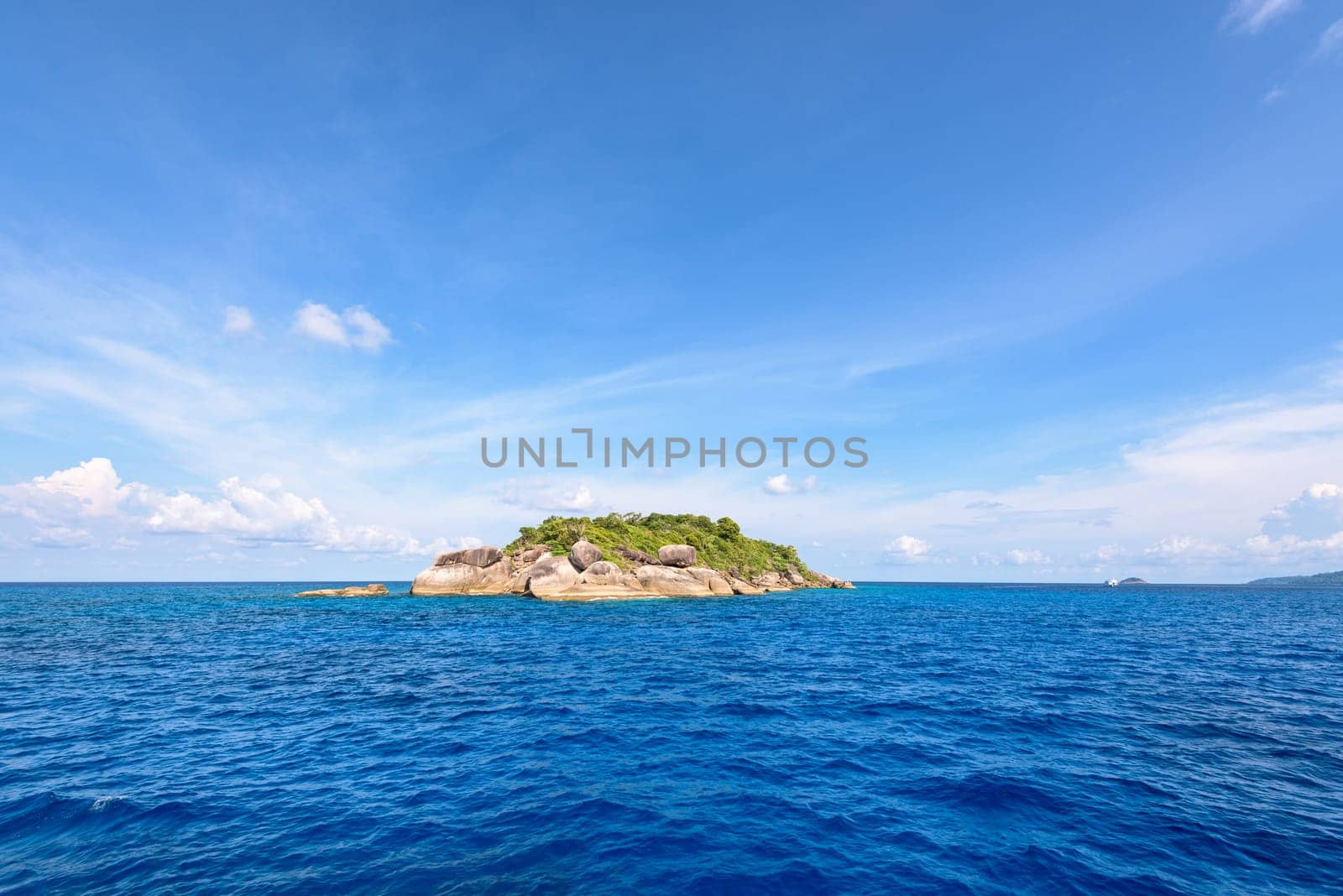 Ko Ha is a small island surrounded by the blue sea under a summer sky at the Mu Ko Similan National Park, Phang Nga Province, Thailand