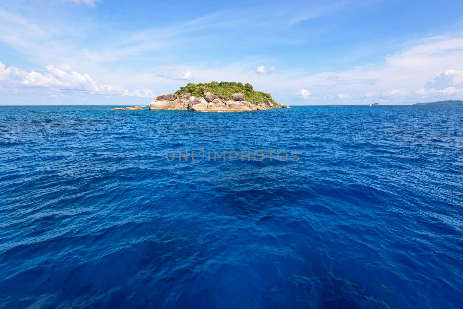 Ko Ha is a small island surrounded by the blue sea under a summer sky at the Mu Ko Similan National Park, Phang Nga Province, Thailand