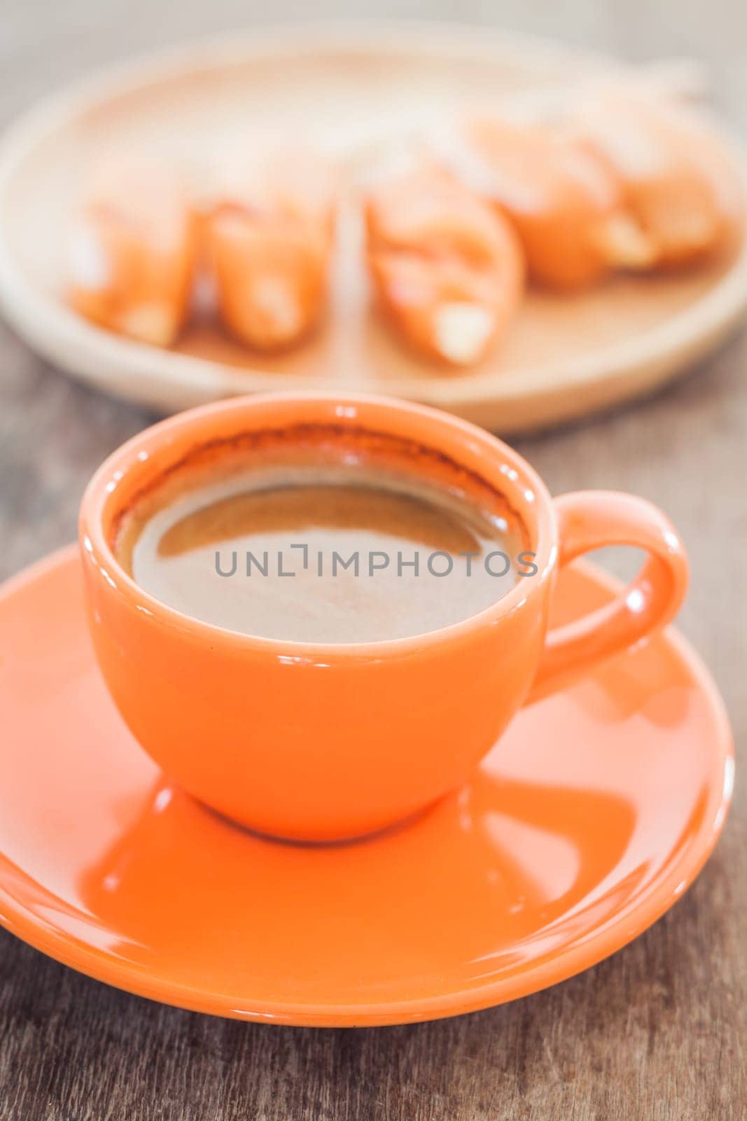 Hot coffee on wooden table, stock photo