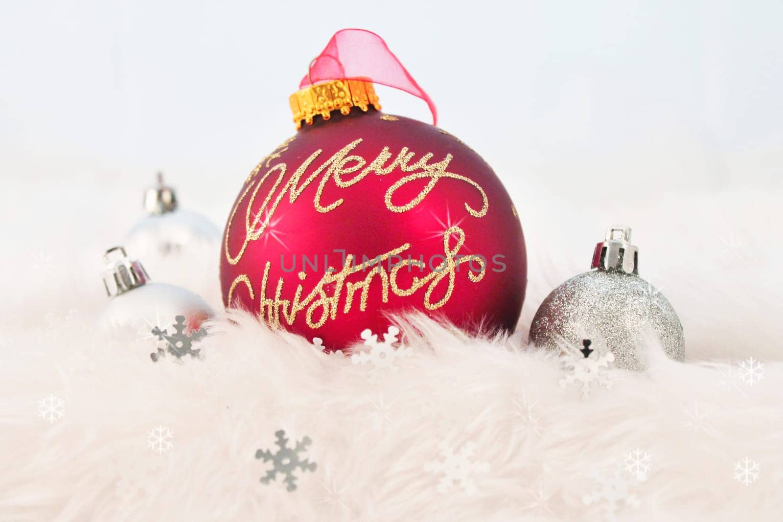 silver christmas decoration with fake snow made of white fur