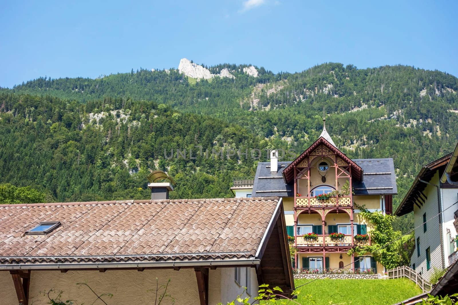 traditional house in the center of St. Wolfgang, Austria - mountain in the background