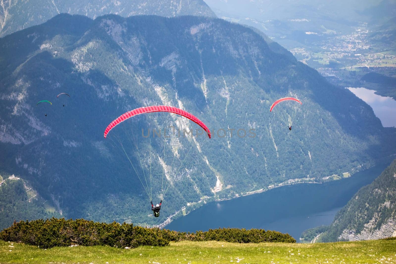 Paraglider at the sky over the Dachstein mountains