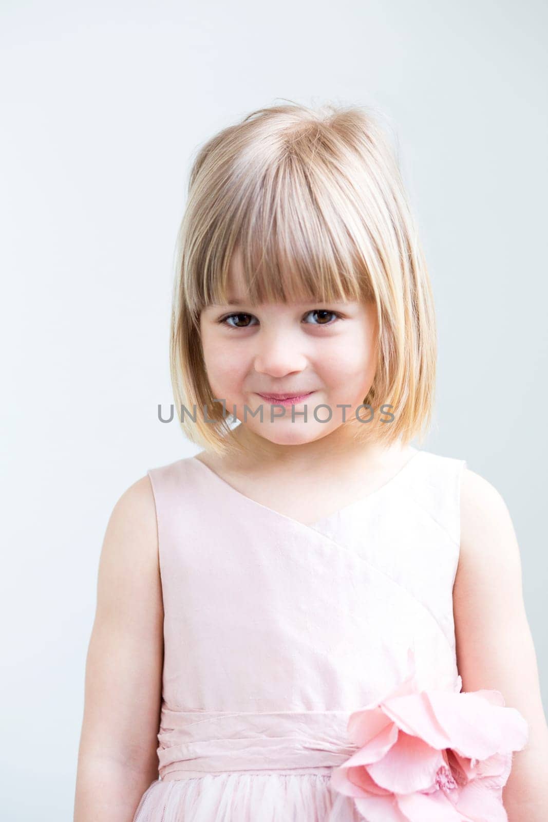 Portrait of a young girl on a white background