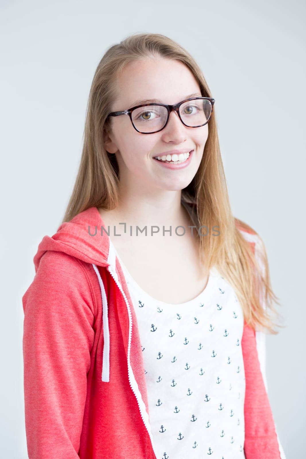 Portrait of an attractive young girl on a white background