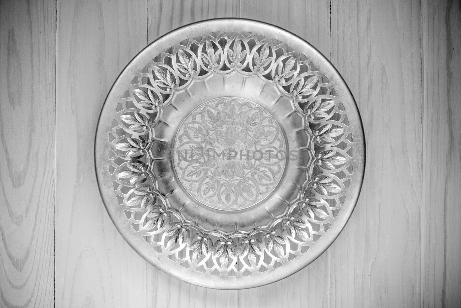 Top view of the silver plate. Black and white photo