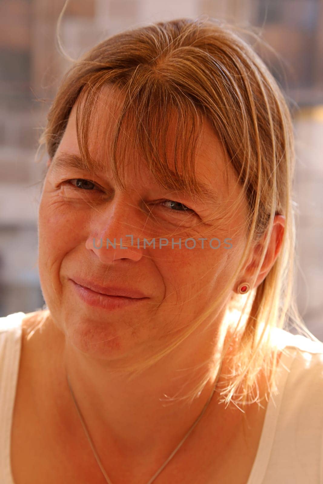 With a slightly sceptical look