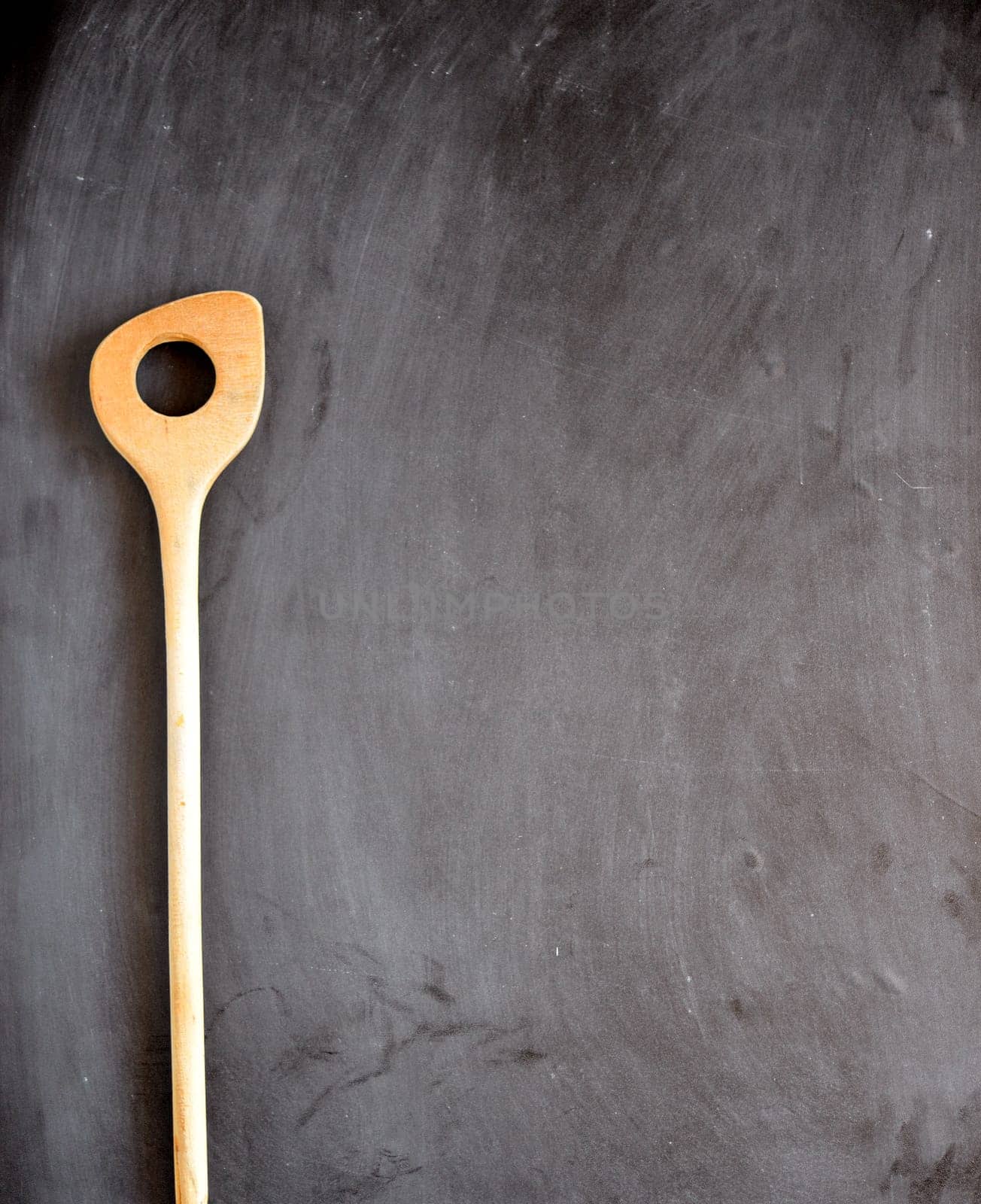 old cooking spoon background kitchen table