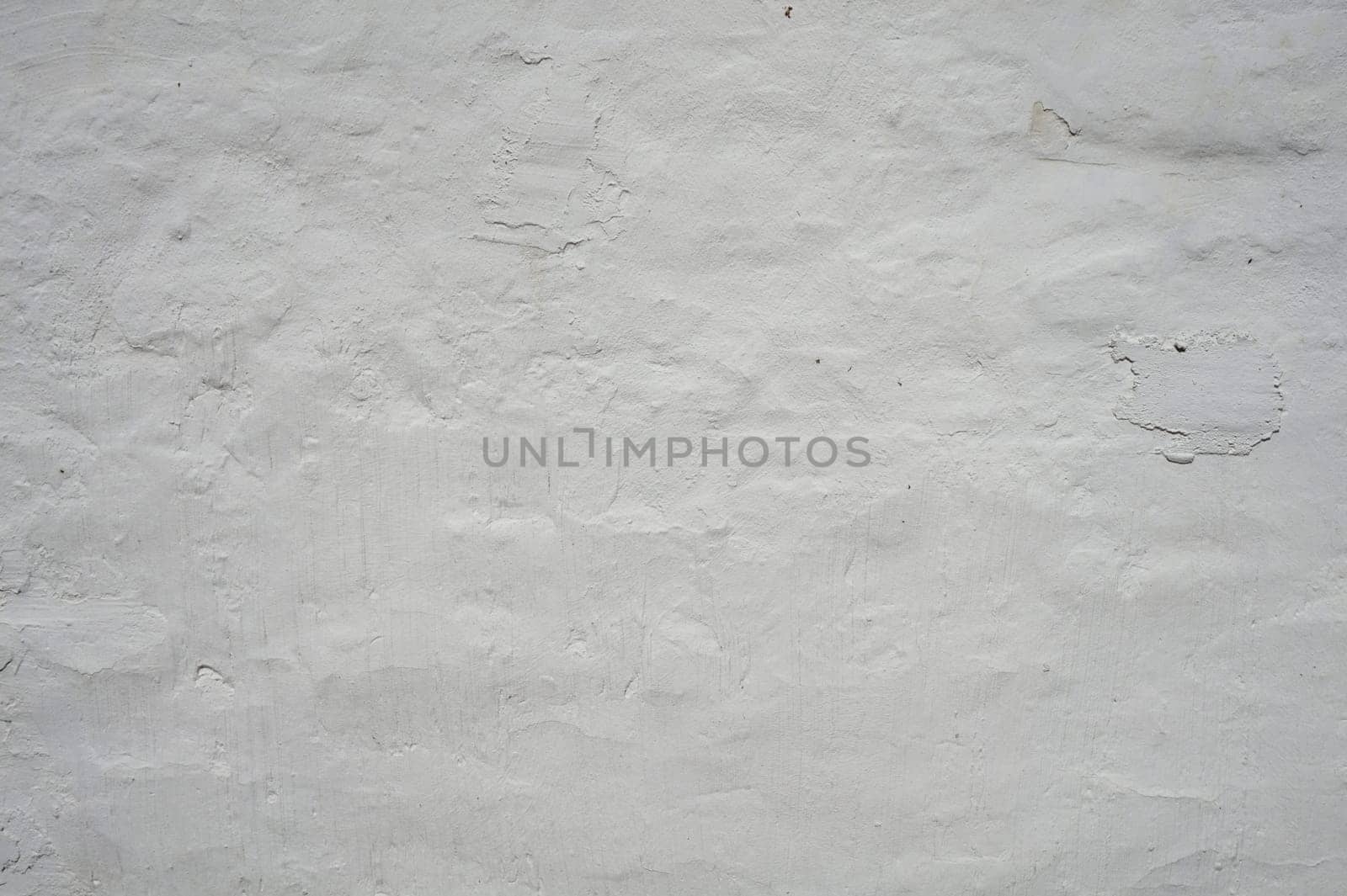 White background of an uneven concrete wall