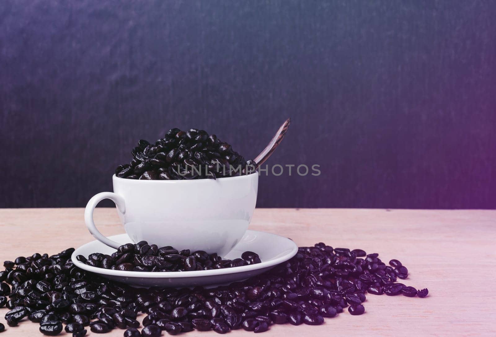 Vintage fresh coffee in a cup of coffee on wooden and grunge background