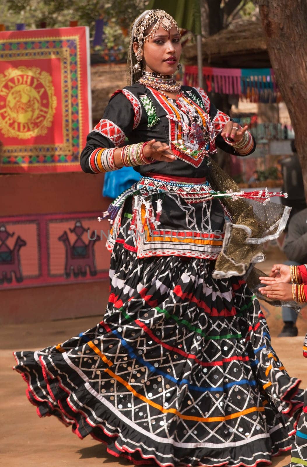 Rajasthani tribal dancer performing at the annual Sarujkund Fair on the outskirts of Delhi, India