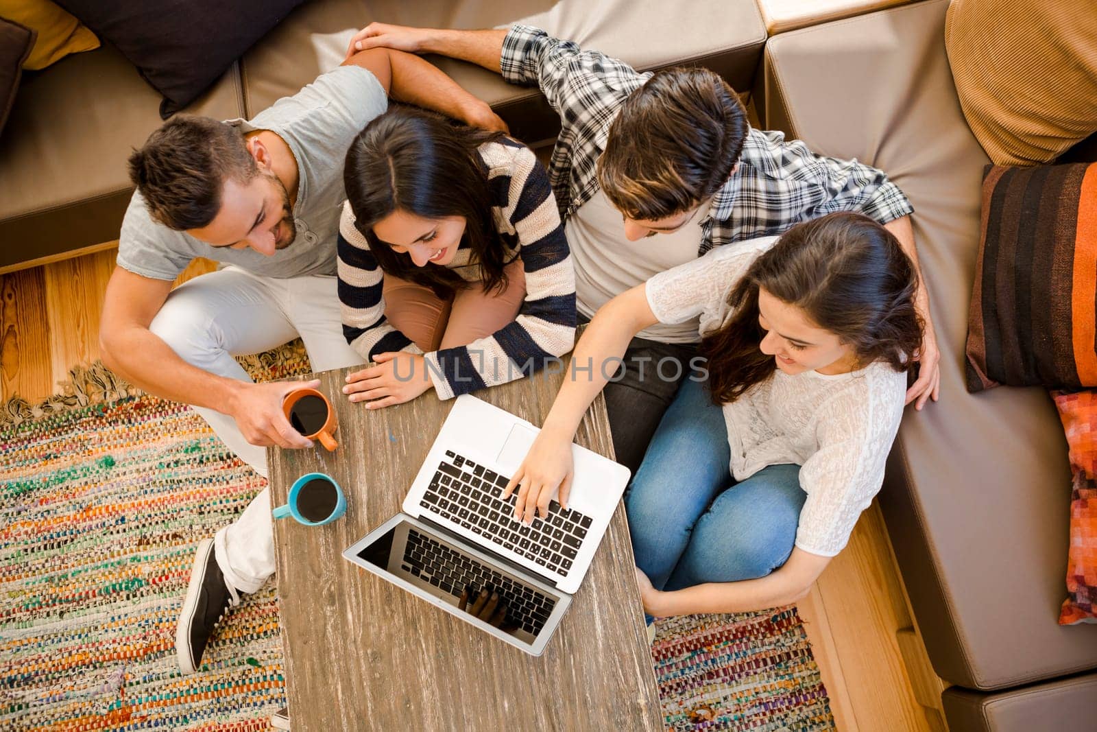 Group of friends study at the local coffee shop