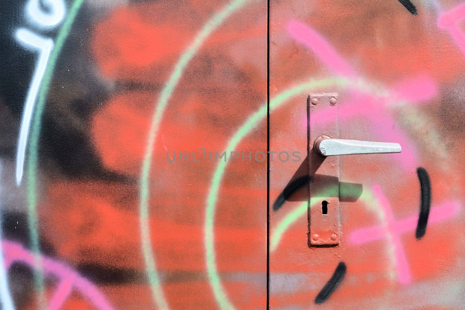 Graffiti on a locked steel door