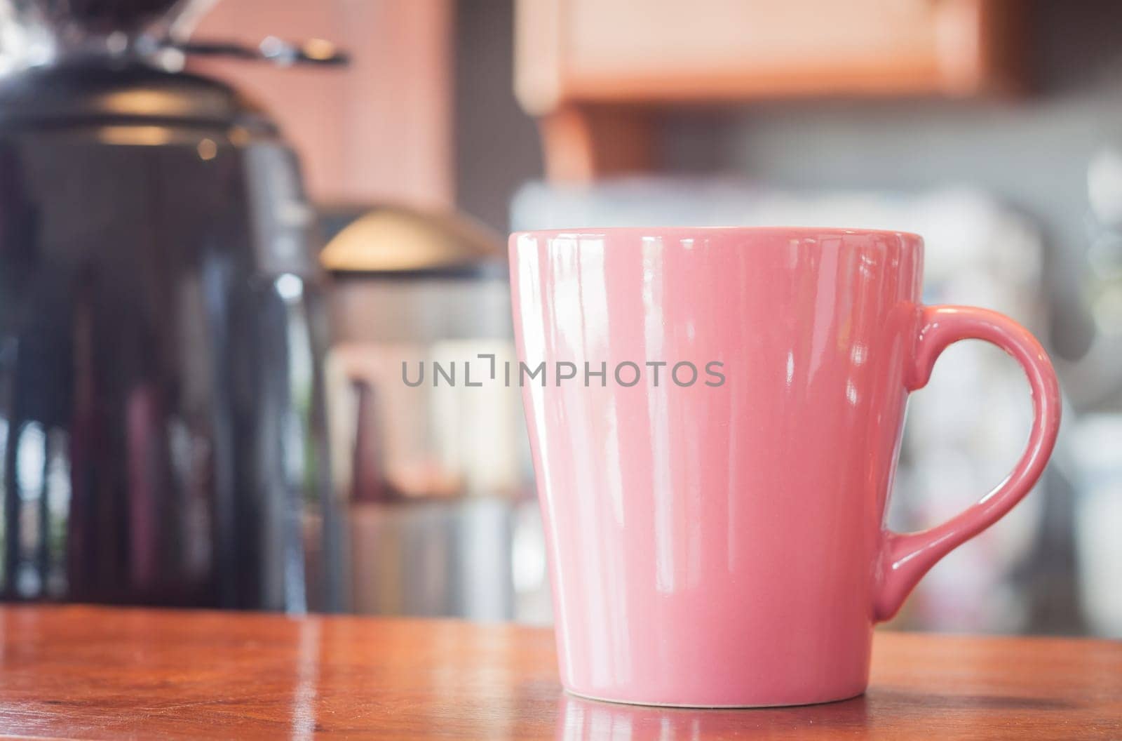 Coffee mug in coffee shop, stock photo