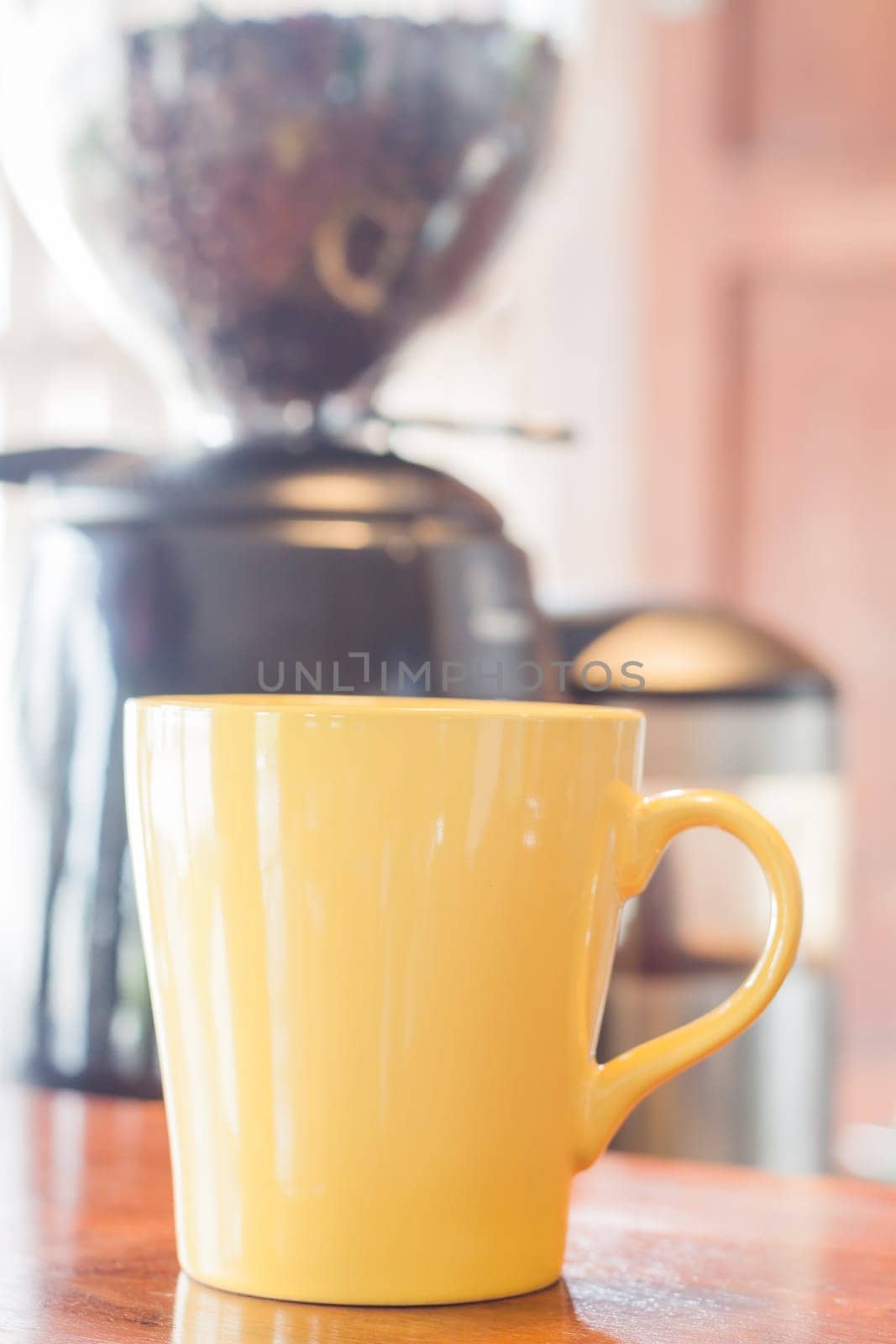 Coffee mug in coffee shop, stock photo