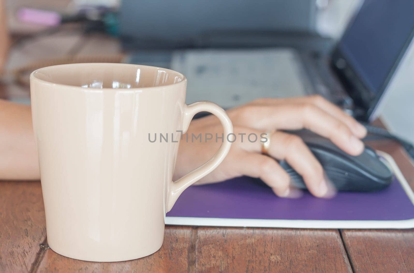 Coffee mug in coffee shop, stock photo
