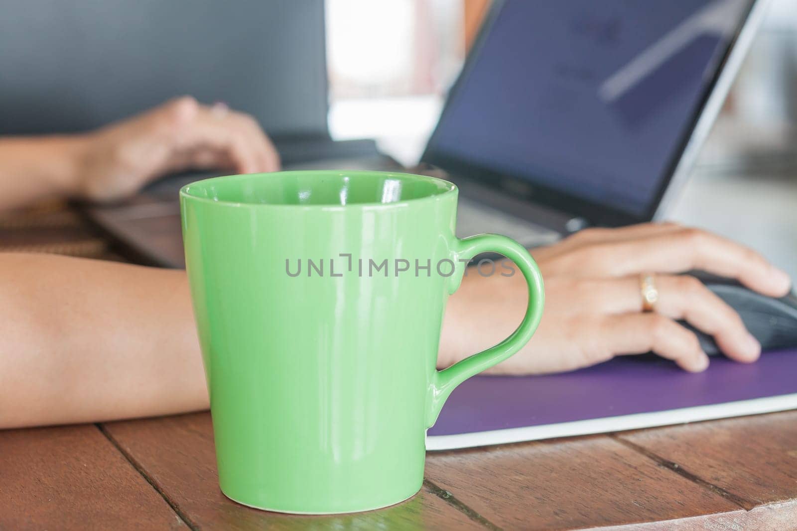 Coffee mug in coffee shop, stock photo