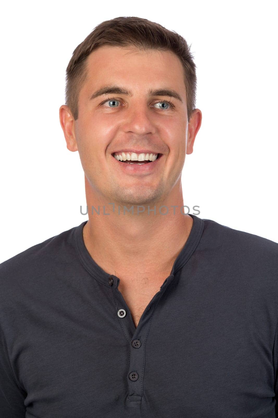 Portrait of a young smiling man close up. Isolate on white.