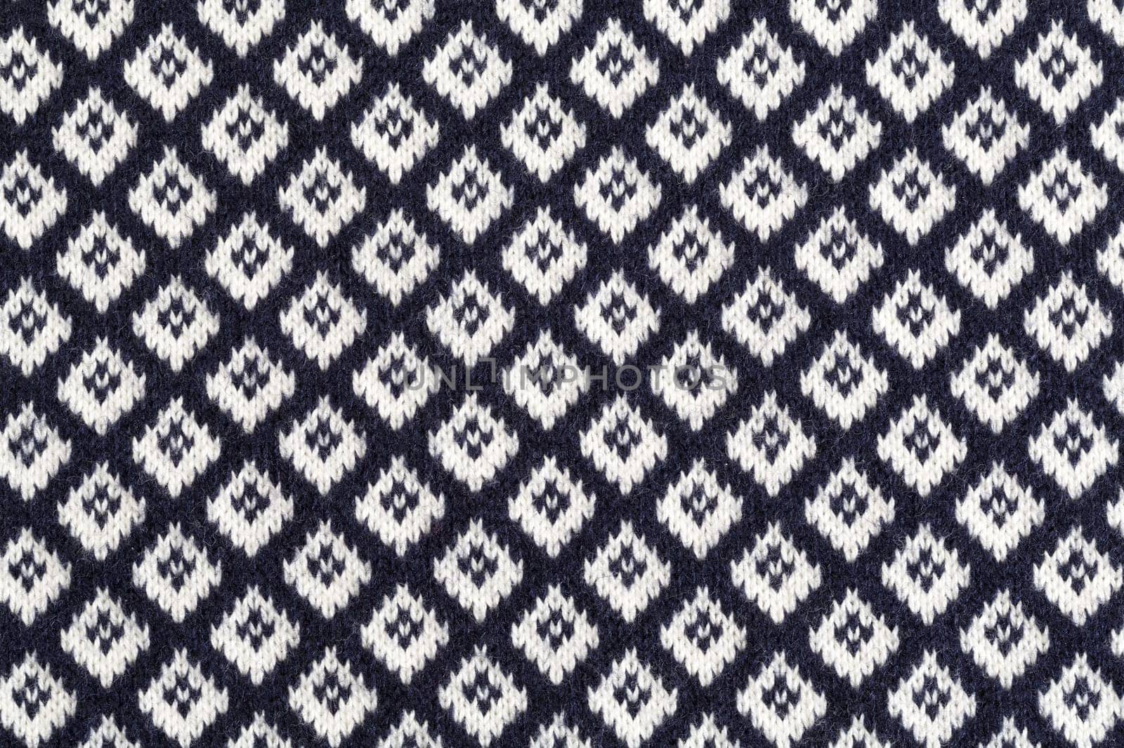 Knitting pattern, pattern square. Woolen cloth.