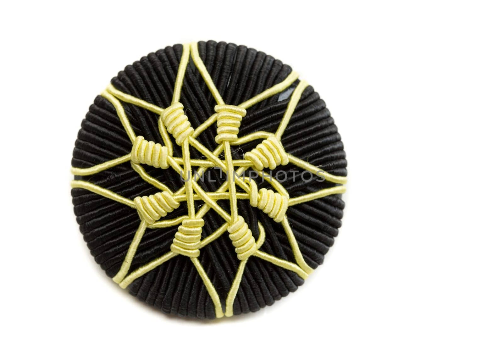 Unusual button from clothing. Isolate on white background.