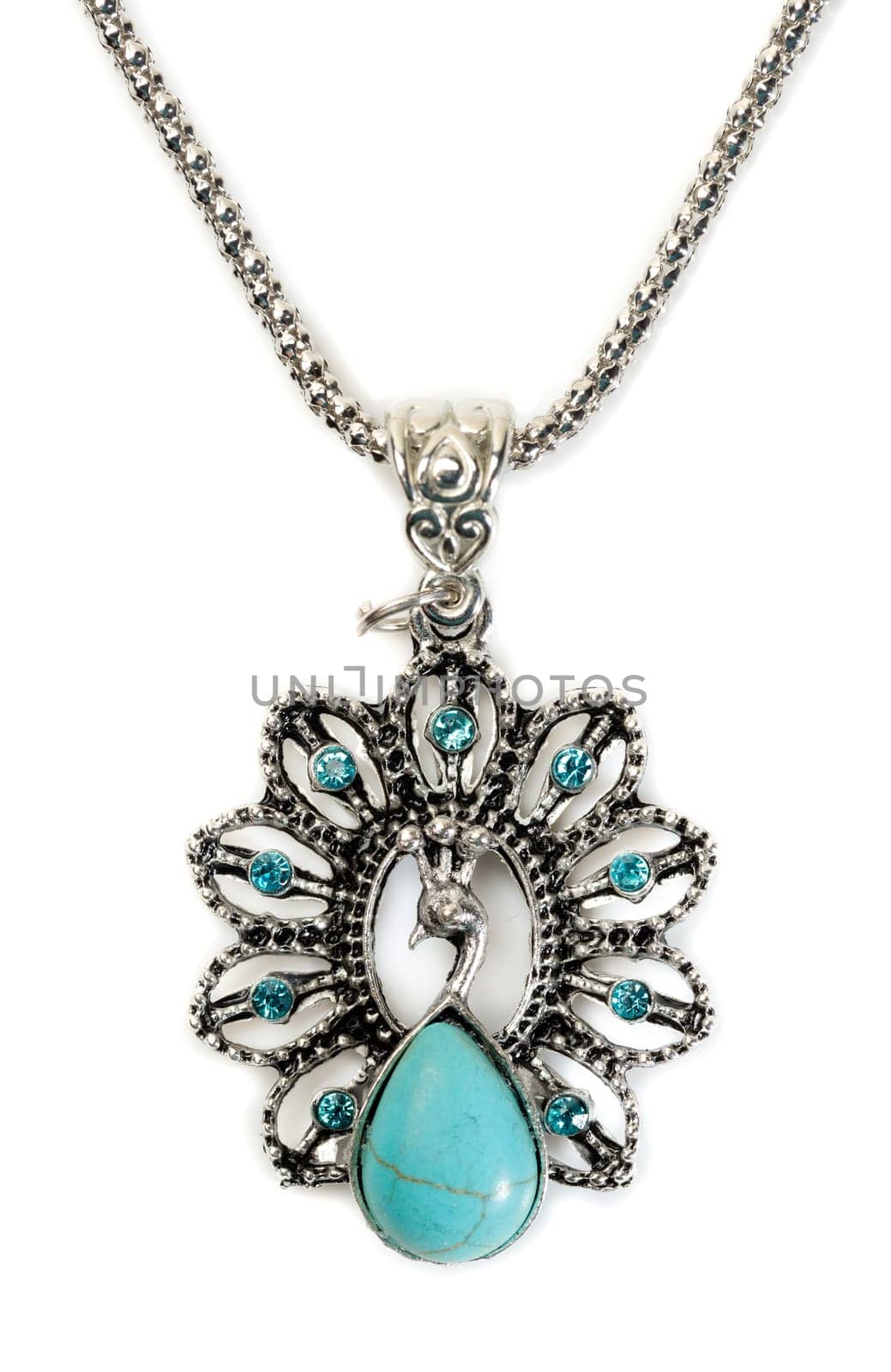 Pendant with turquoise stone in a silver frame. Isolate on white.