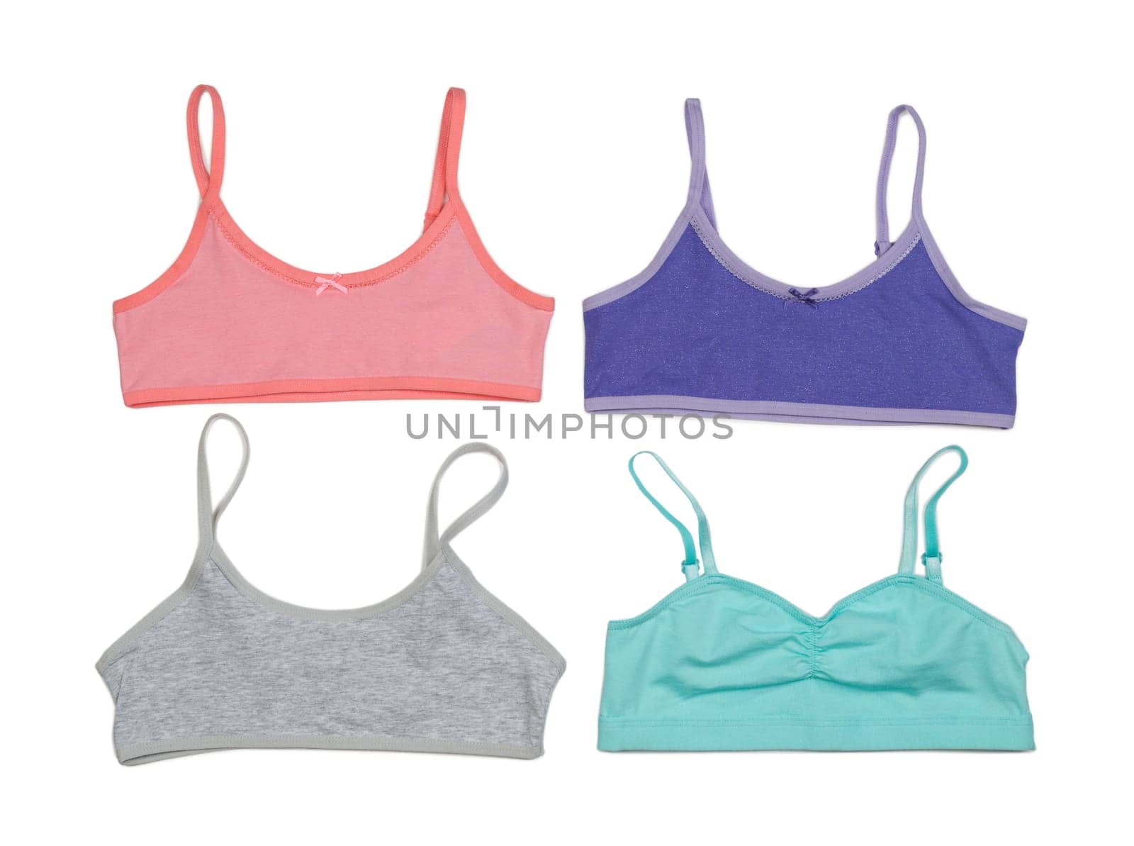 Set of colored cotton bras. Isolate on white.