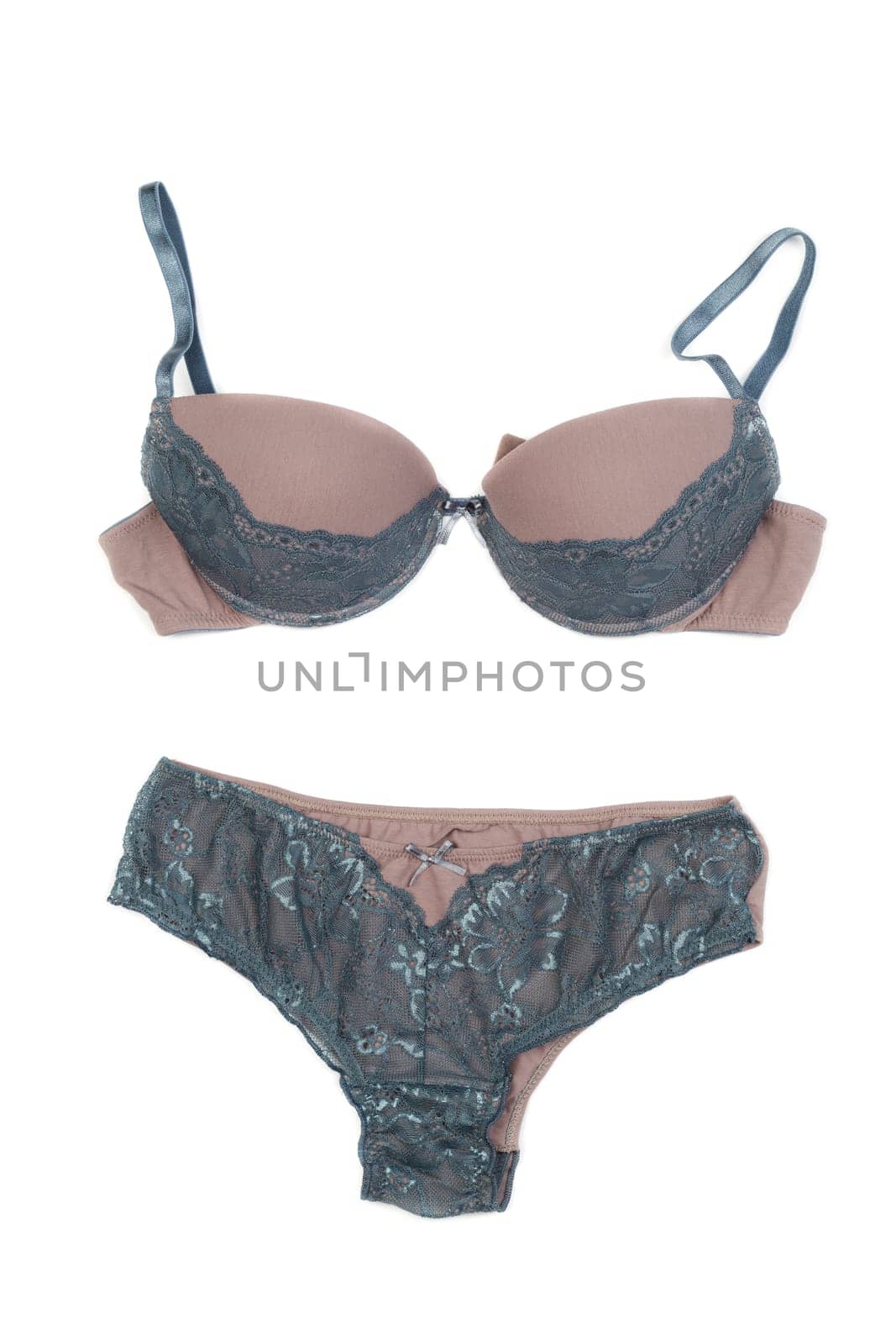 Set beige lingerie. Isolate on white.